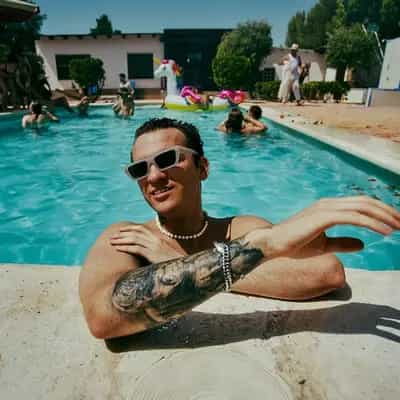 Friends relaxing at a summer pool party